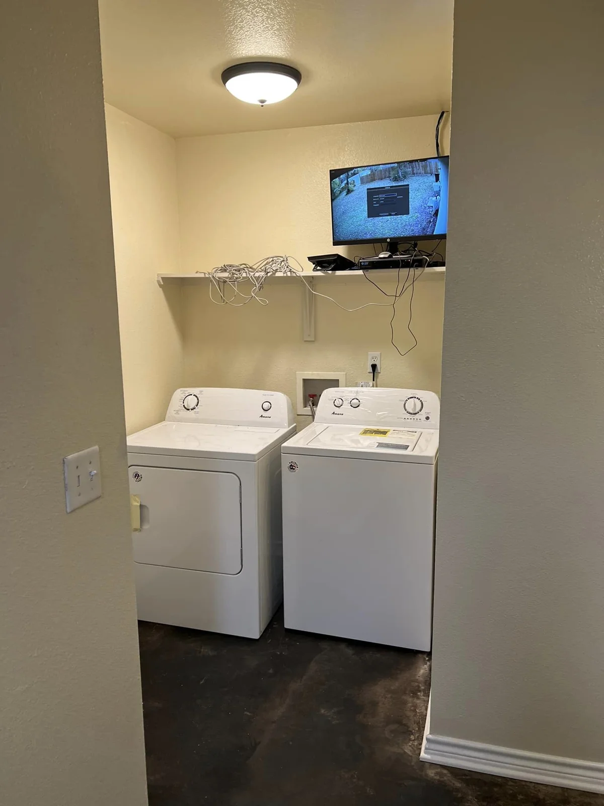 Shared laundry area with washer and dryer